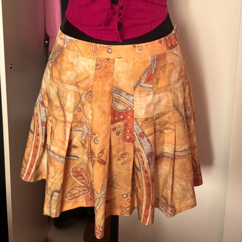 Orange print pleated skirt